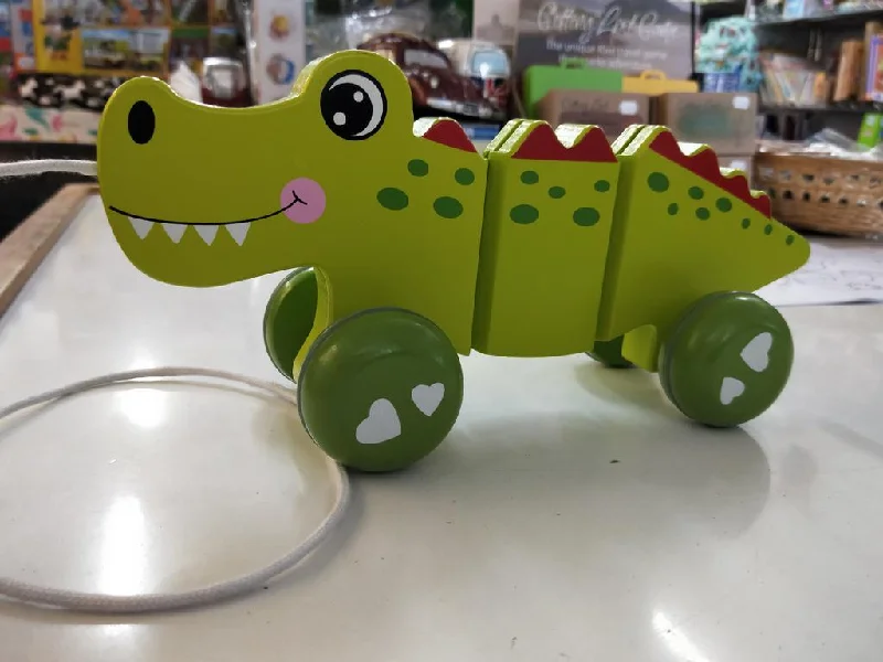 robust and durable wooden toys that are built to last                   Crocodile pull along