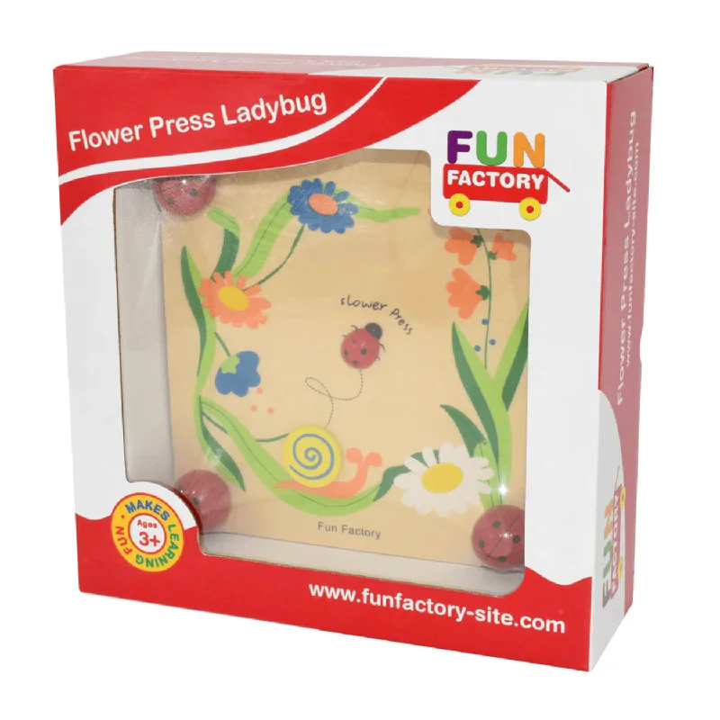enchanting and magical wooden toys that spark the imagination                   Flower Press Ladybug